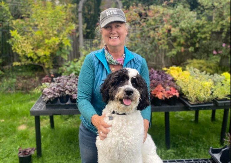 Cindy Funes with her garden dog